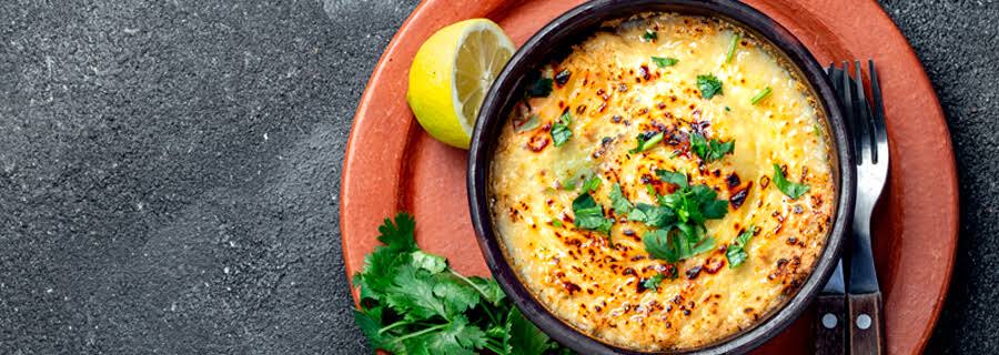 Chupe de navajuelas servido en un plato